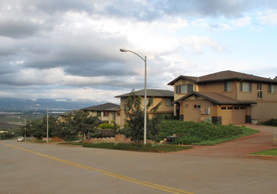 The home of civilian defense contractor Benjamin Pierce Bishop in Kapolei, Hawaii, is seen at right on March 18, 2013.