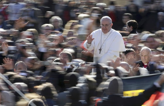 Pope Francis waves as he arrives in Saint Peter's Square for his inaugural mass at the Vatican. Pope Francis celebrates his inaugural mass on Tuesday among political and religious leaders from around the world and amid a wave of hope for a renewal of the scandal-plagued Roman Catholic Church.