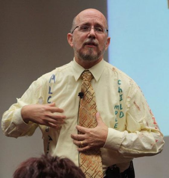 Russell W. Strand, chief in the education and training division at the Army's Military Police School, gives a presentation about suspect behavior to a special unit victims course at Ft. Leonard Wood in Missouri.