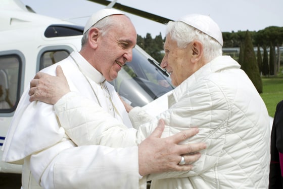 Pope Francis, left, embraces Pope Emeritus Benedict XVI as he arrives at the Castel Gandolfo summer residence March 23. Pope Francis traveled by helicopter from the Vatican to Castel Gandolfo for a private meeting with the former Pope Benedict XVI.
