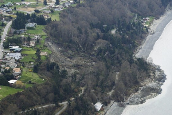 An aerial photo shows a landslide near Coupeville, Whidbey Island, Wash., on Wednesday. The slide severely damaged one home and isolated or threatened others.