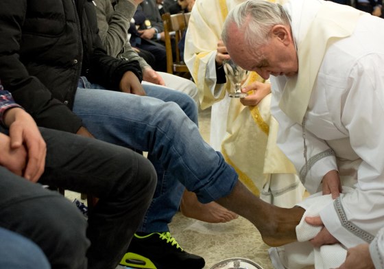 Pope Francis washes the feet of a young offender during a mass at the church of the Casal del Marmo youth prison on the outskirts of Rome as part of Holy Thursday on March 28.
