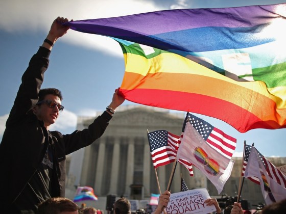 George Washington University students and hundreds of others rally outside the Supreme Court during oral arguments in a case challenging the Defense of Marriage Act (DOMA) March 27, 2013 in Washington, DC.