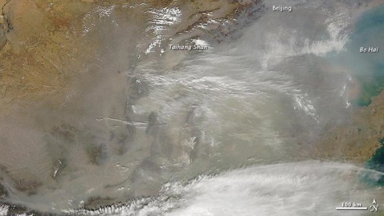 NASA's Aqua satellite captured this image of a dust storm from the Gobi Desert that blew across the coastal plain of eastern China in mid-March 2013. This week, California air pollution watchdogs report dust from that storm reached Owens Valley, on the east side of the Sierra Nevada.