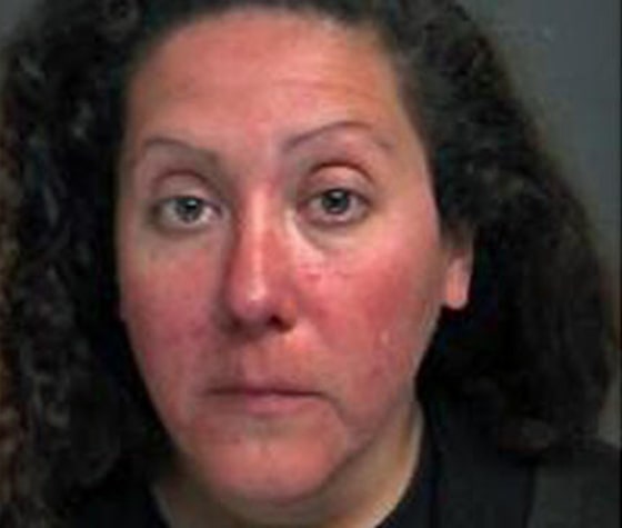 Mom charged with leaving 4 kids in car while she drank in bar