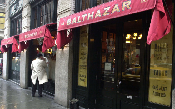 NEW YORK - JANUARY 31: A pedestrian walks past the front of the SoHo restaurant Balthazar Janauary 31, 2003 in New York City. The French style bistro...