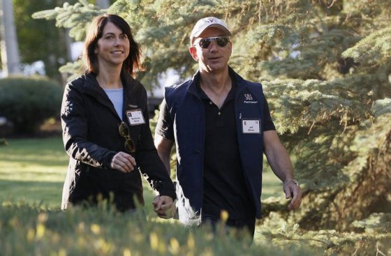 Amazon CEO Jeff Bezos and his wife, MacKenzie, arrive at the annual Allen and Co. conference at the Sun Valley, Idaho, Resort on July 12, 2013. She is criticizing a new book about her husband and the company.