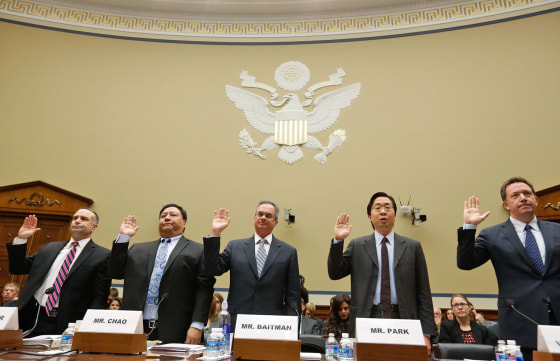 Obama Administration technology officials swear in before they testify before the House Oversight and Government Reform Committee hearing