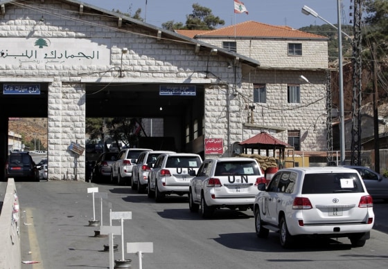 A convoy of inspectors from the Organization for the Prohibition of Chemical Weapons prepares to cross into Syria at the Lebanese border crossing point of Masnaa, eastern Bekaa Valley, Lebanon, on Oct. 1.
