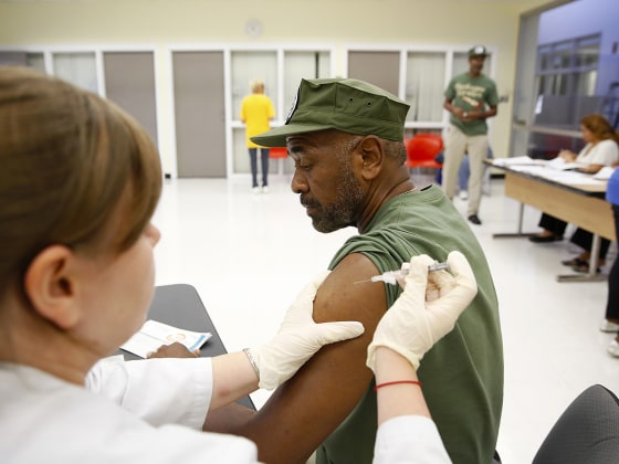 IMAGE DISTRIBUTED FOR NATIONAL COUNCIL ON AGING AND SANOFI PASTEUR - Joseph Robert receives his flu shot during the Falls and Flu Prevention Day at th...