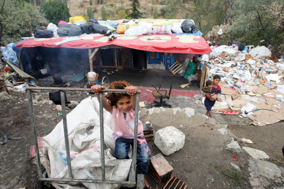 Syrian children refugees, who flock by dozens in Turkey each day, play on Friday at a makeshift camp in Ankara, where they arrived three months ago.