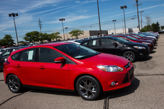 DETROIT, MI - SEPTEMBER 06: A 2014 Ford Focus sits for sale at Bill Brown Ford Dealership on September 6, 2013 in Livonia, Michigan. U.S. auto giants...