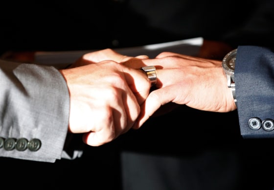 Plaintiffs in the California's Proposition 8 case Paul Katami (R) and Jeff Zarrillo exchange wedding rings in Los Angeles, California in this June 28,...