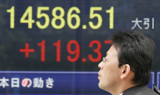 Japan's Nikkei 225 Index closed at 14,588.51 after gaining 119.37 points, or 0.83 percent, in Tokyo following the debt deal.