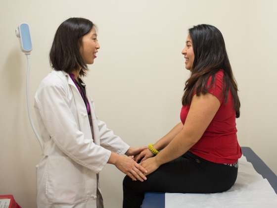 Physician assistant Mable Dunn examines Jaqueline Lopez at Mary's Center, a community health center in Washington, D.C.,