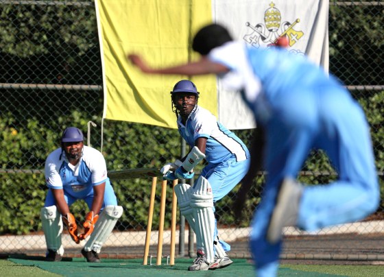 A player from a team of priests and seminarians prepares to return a ball during a training session at the Maria Mater Ecclesiae's Catholic College in Rome on Tuesday.