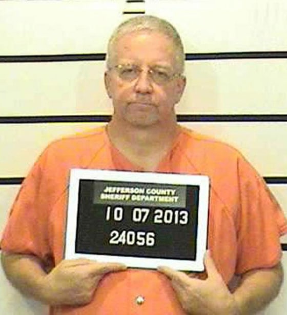 This Oct. 7, 2013 booking photo provided by the Jefferson County Sheriffs Deptartment shows William Rhinaman, an information technology employee at the Steubenville, Ohio City Schools.