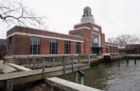 This March 26, 2007, file photo shows the ferry building on Ellis Island, N.J. The National Parks Service says the Ellis Island Immigration Museum will reopen to the public on Monday.