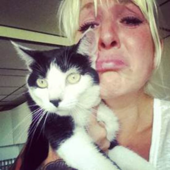 Caitlin Stewart of Woodstown, N.J., reacts to finding her cat, Bird, in December of 2012 after having lost her during Hurricane Sandy on Oct. 29, 2012. Hundreds of unclaimed or abandoned pets remain in the streets or in shelters a year after the Category 2 storm, volunteer pet rescue officials say.