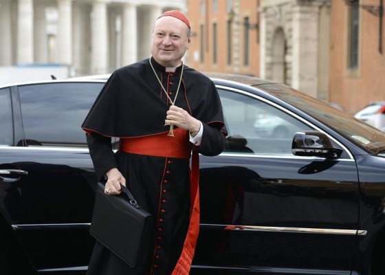 Cardinal Gianfranco Ravasi of Italy arrives for a meeting in the Synod Hall at the Vatican March 8, 2013. REUTERS/Dylan Martinez