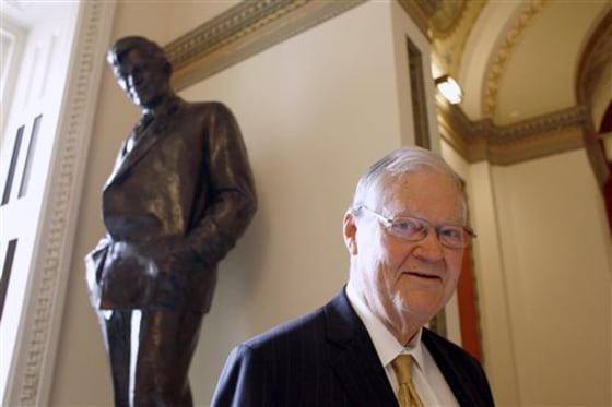In this Nov. 16, 2010 file photo, Rep. Ike Skelton, D-Mo., who lost his seat earlier that month, poses for a photograph in front of the Will Rogers Statue, on Capitol Hill in Washington.