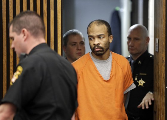 Michael Madison is led into court in Cleveland on Thursday for his arraignment on updated charges that include aggravated murder.