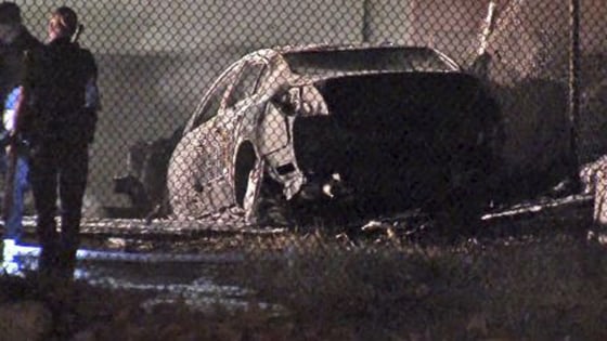 Officials at the site of a fiery single-vehicle crash Saturday that killed 5 people in Burbank, Calif.