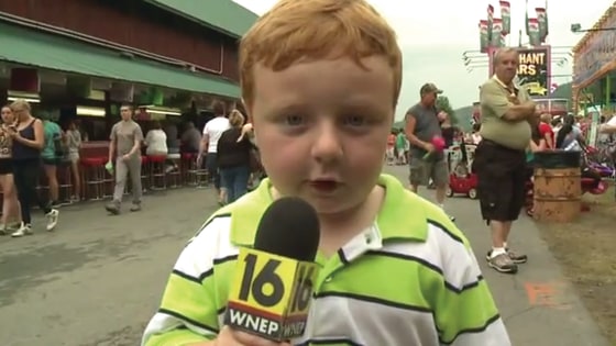 Little boy steals TV interview