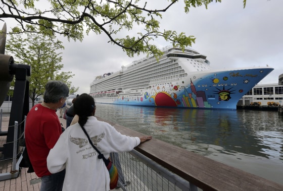 People pause to look at the Norwegian Breakaway on the Hudson River in New York in May 2013. A 4-year-old child died after being pulled unresponsive from a swimming pool on the Norwegian Breakaway on Feb. 3, 2014.
