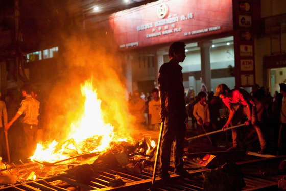 Striking garment workers set up barricades in Phnom Penh on Jan. 2.