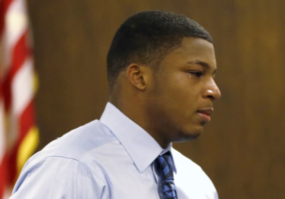 Ma'Lik Richmond walks towards the victim and her family to apologize after he and co-defendant Trent Mays were convicted in juvenile court last year.