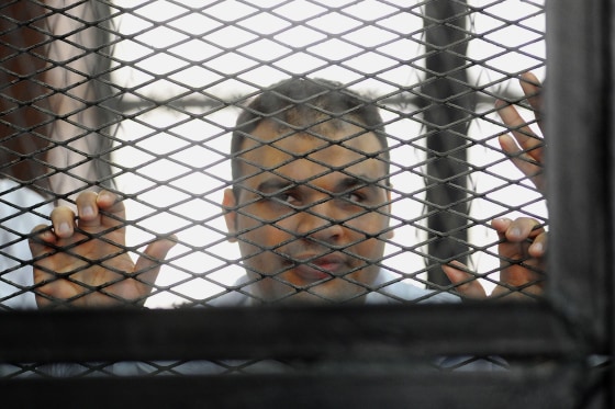 Mohammed Badr, a cameraman for Al-Jazeera Mubasher Misr, appears at a court in Cairo on Dec. 4, 2013.