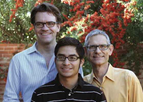 Stephen Russell, left, and partner Scott Neeley, with son Enrique.
