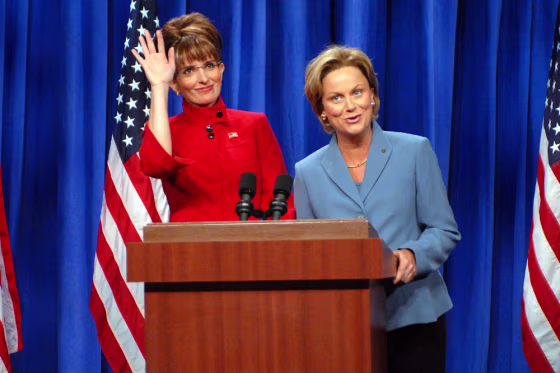Image: Tina Fey and Amy Poehler impersonate Sarah Palin and Hillary Clinton