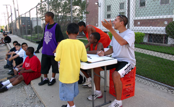 Rob Castañeda, right, with some of the kids in his Beyond the Ball program.