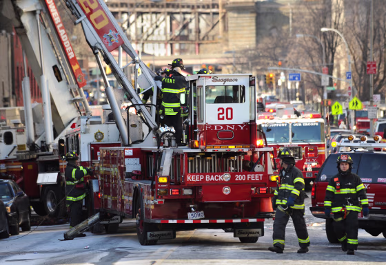 Image: Firefighters at an apartment building fire