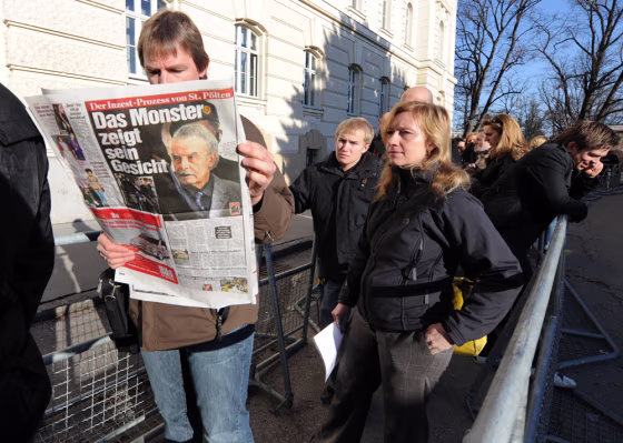 Image: Journalists and visitors outside court house