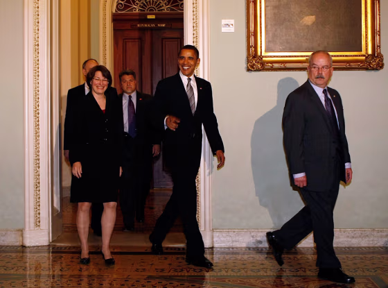 Image: Obama attends senate democratic caucus meeting