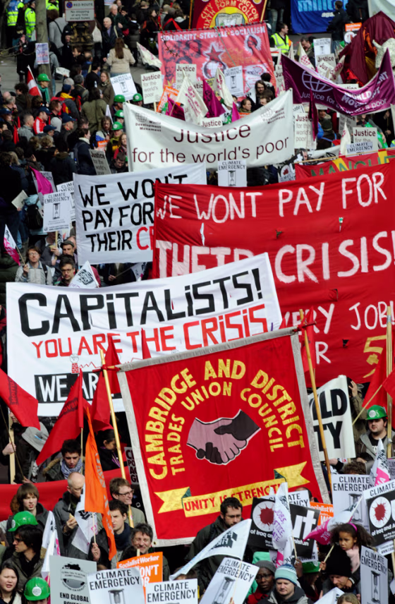 Demonstrators march ahead of next week's G20 summit in London