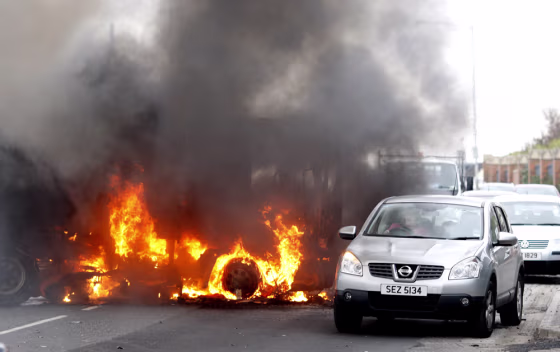 Image: hi-jacked vehicles set on fire