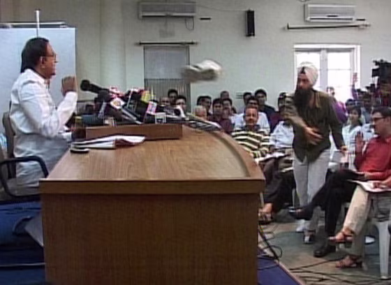 Image: Video frame grab shows a journalist throwing his shoe at India's Home Minister Chidambaram in New Delhi