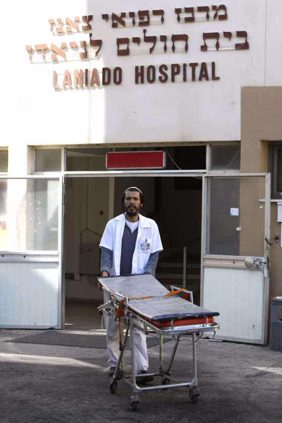 Image: A medic pushes an empty trolley at the Laniado hospital