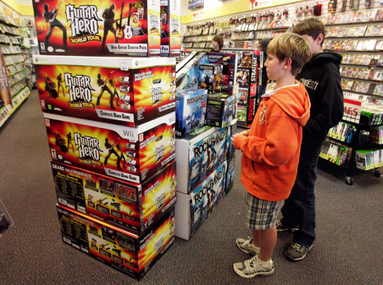 Image: Guitar Hero and Rock Band 2 video game bundles are seen on display at a GameStop store in Redwood City, Calif.