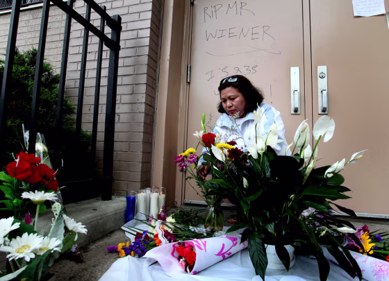 Image: Math teacher Emelinda Mabulay places flowers