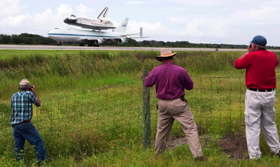 Image: Space Shuttle Discovery Returns To Cape Canaveral From California