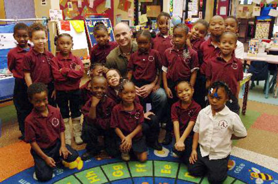 Andre Agassi and students from Andre Agassi College Preparatory after a classroom visit. 