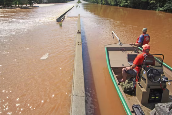Both lanes of Interstate 20 at Sweetwater Creek near Lithia Springs, Ga., were swamped during the flooding there earlier this week.&nbsp;A U.S. Geological Survey crew measures flood depths and that same day saw someone drive a SUV across the left lane, making it across but nearly being swept away.