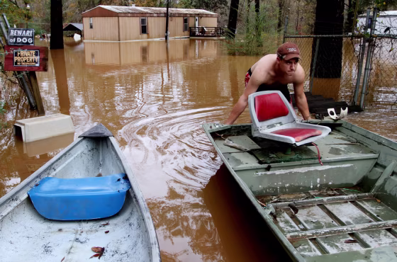 Image: Ricky Catrett loads a boat onto a trailer