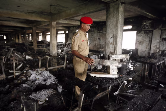 Image: Twenty-one workers killed in factory fire