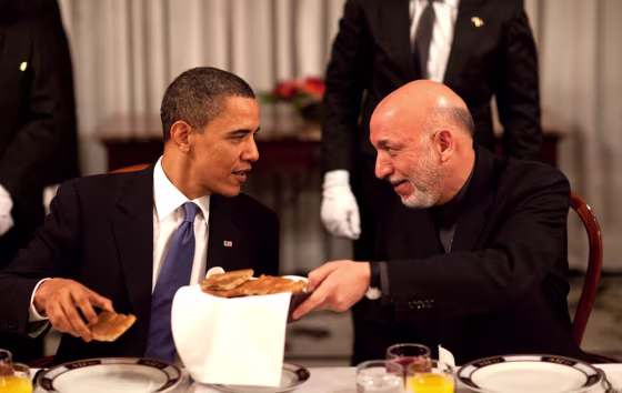 Image: President Hamid Karzai chats with President Barack Obama